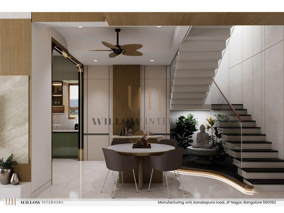 Pooja space and indoor garden under the staircase beside the dining area — 3D interior design for an independent house in Bangalore