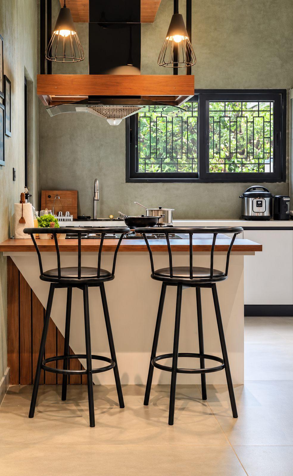 Gubbi Gudu villa, Anjanapura, Bangalore — kitchen breakfast counter with bar stools and pendant lights