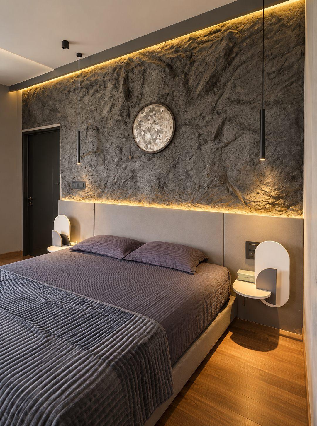 Gubbi Gudu villa, Anjanapura, Bangalore — master bedroom with a hand-finished textured POP wall and moon motif